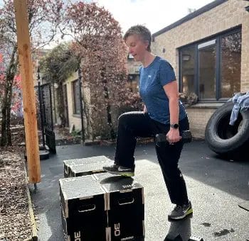 Athlete performing strength training with sled at SHARP GYM